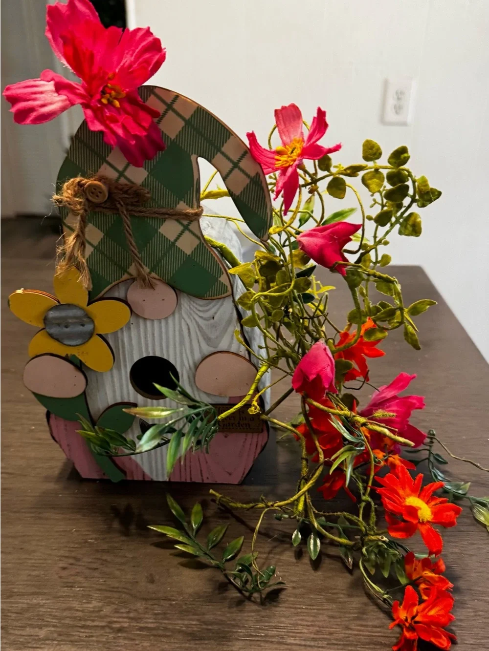 Gnome birdhouse with flowers